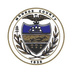 Monroe County Area Agency on Aging logo in a circle with a shield and eagle in the center