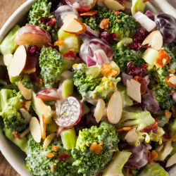 Broccoli salad with grapes, almonds, carrot, and dressing
